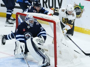 Jets goalie Connor Hellebuyck figures his team just needs a few bounces to go its way in order to get back into series with the Golden Knights.