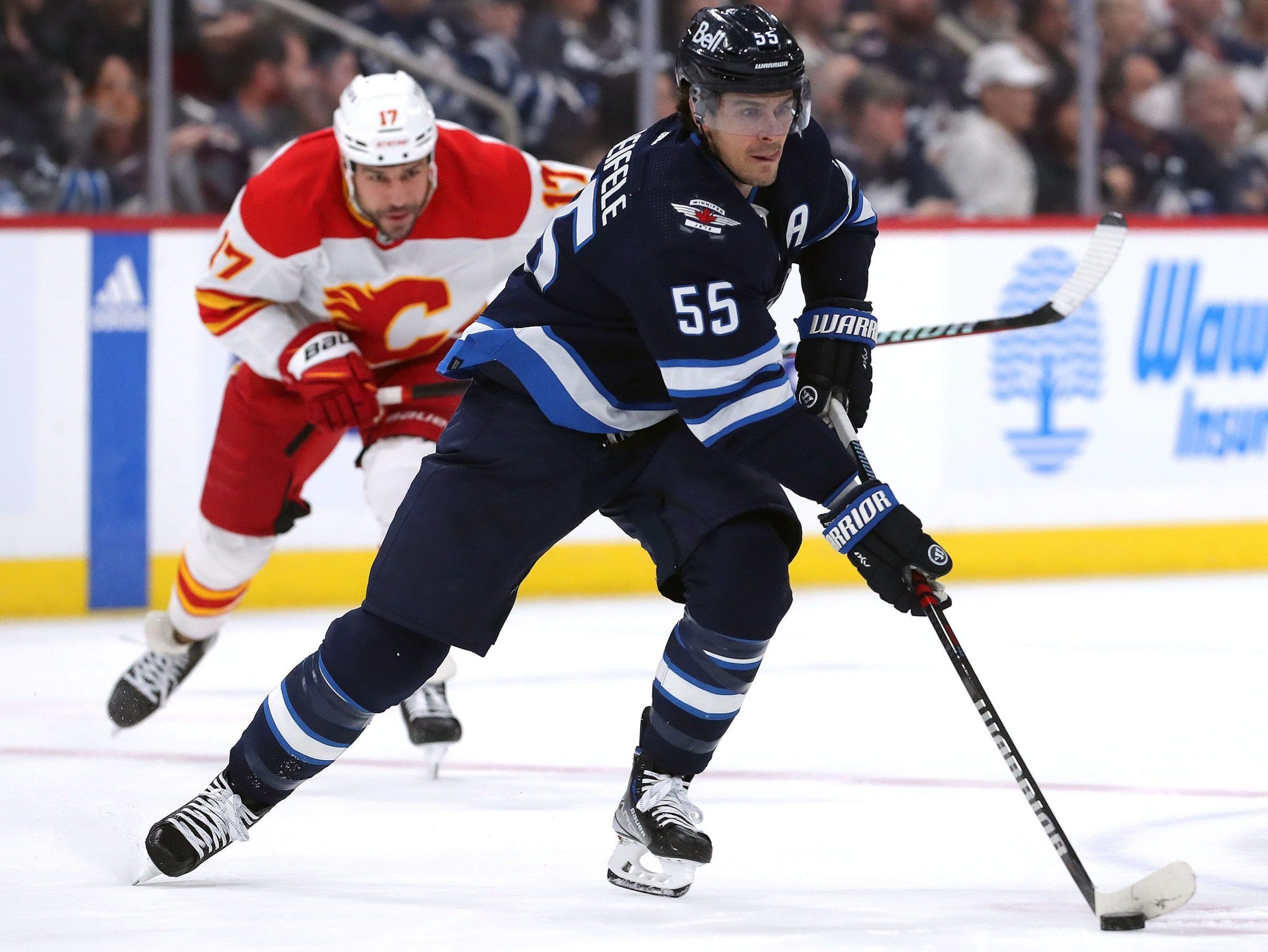 Scheifele scores twice as Jets beat Rangers in season opener