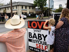 Anti-abortion protesters from Operation Save America protest outside of a Planned Parenthood clinic in Nashville, July 29, 2022.