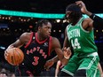 Apr 5, 2023; Boston, Massachusetts, USA; Toronto Raptors forward O.G. Anunoby drives the ball against Boston Celtics center Robert Williams III in the first quarter at TD Garden.