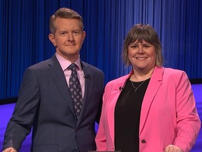 Emma Hill Kepron (right) with host and Jeopardy! super champion Ken Jennings. Hill Kepron's run as Jeopardy! chmpion ended Monday.