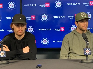 Jets winger Mason Appleton and centre Adam Lowry listen to questions from to the media during the team's post-season availability on Saturday, April 29, 2023, at Canada Life Centre.