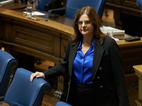 Manitoba Premier Heather Stefanson stands in the chamber, as Finance Minister Cliff Cullen prepares to deliver the 2023 budget in the Manitoba Legislative Building in Winnipeg on Tuesday, March 7, 2023.