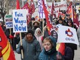 Members of the Public Service Alliance of Canada demonstrate outside the Treasury Board building in Ottawa, March 31, 2023.