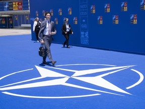 Prime Minister Justin Trudeau leaves the NATO summit, in Madrid, June 30, 2022.