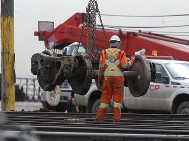 A train derailment caused numerous businesses to be evacuated, and closed a busy street in Winnipeg on Friday, April 21, 2023.