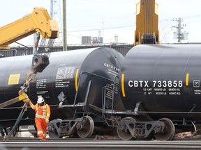 A train derailment caused numerous businesses to be evacuated, and closed a busy street in Winnipeg on Friday, April 21, 2023.