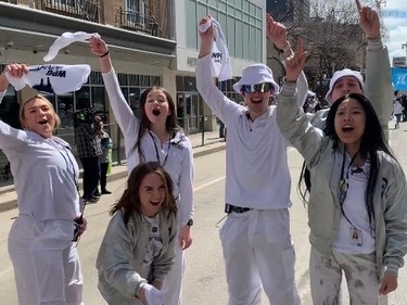 Members of the Jets cheer team whoop it up at the start of the Winnipeg Whiteout Street Party on Saturday, April 22, 2023, outside Canada Life Centre in Winnipeg prior to the start of Game 3 of the Jets-Vegas Golden Knights NHL playoff series.
