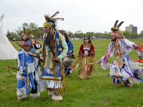 First Nations dancers are seen taking part in a Grand Entry during a “land reclamation” ceremony at the site of the former Kapyong Barracks, a site that will one day be home to the largest urban reserve in Canada.