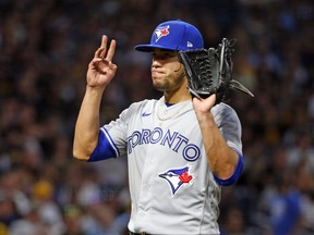 Jose Berrios #17 of the Toronto Blue Jays acknowledges the crowd after leaving the game in the seventh inning against the Pittsburgh Pirates during inter-league play at PNC Park on May 6, 2023 in Pittsburgh, Pennsylvania.