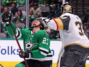 Adin Hill of the Vegas Golden Knights hits Mason Marchment of the Dallas Stars during Game 6 of the Western Conference Final at American Airlines Center on May 29, 2023 in Dallas.