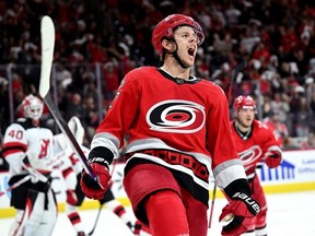 Hurricanes forward Jesperi Kotkaniemi celebrates after scoring his second goal of the second period against the Devils in Game 2 of the Second Round of the 2023 Stanley Cup Playoffs at PNC Arena in Raleigh, N.C., Friday, May 5, 2023.