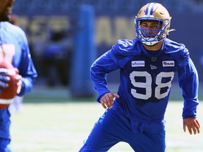 Winnipeg Blue Bombers' first-round draft choice Anthony Bennett keeps his eyes on the football during Day 1 of rookie camp on Wednesday at IG Field.