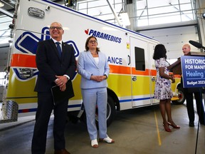 Mayor Scott Gillingham (left) and Premier Heather Stefanson during a press conference to announce a new ambulance agreement between the city and province at WFPS No. 11 station on Portage Avenue in Winnipeg on Wed., May 24, 2023.