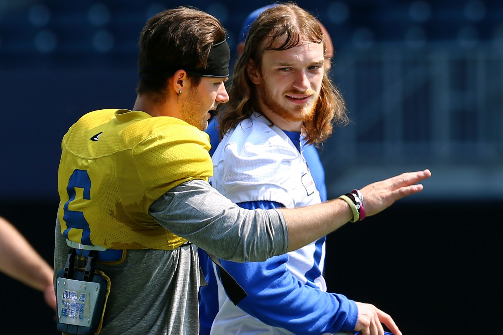 Receiver Jeremy Murphy takes some direction from Winnipeg Blue Bombers No. 2 quarterback Dru Brown during training camp on Wednesday.