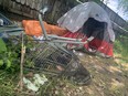 An encampment set up along the banks of the Red River near The Forks