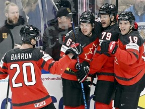 Canada's Samuel Blais celebrates scoring their first goal with teammates during Canada's gold medal game against Germany in the IIHF World Hockey Championship in Tampere, Finland.
