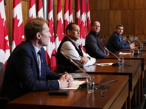 Minister of Crown-Indigenous Relations Marc Miller, left to right, joins Chiefs of the First Nations forming the Regroupement Petapan, Real Tettaut (Nutashkuan), Martin Dufour (Essipit), and Gilbert Dominique (Mashteuiatsh) during a press conference in Ottawa on Thursday, May 4, 2023, regarding the Petapan Treaty project.