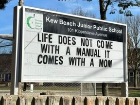 A message board outside Kew Beach Junior Public School has sparked outrage in the community.