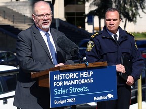 Justice Minister Kelvin Goertzen (left) and Police Chief Danny Smyth during a press conference on enhanced bail, across from the Law Courts building in Winnipeg on Monday, May 1, 2023.