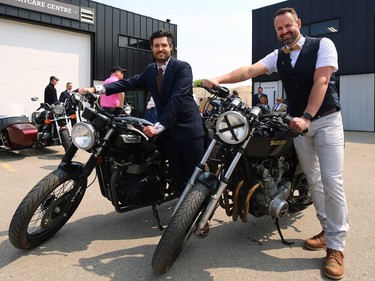 Marc Perreault (right) and Louis Rondeau, leaders of the Winnipeg Distinguished Gentlemen's Ride, pose outside motorcycle shop Moto 49 in St. Boniface on Sun., May 21, 2023. A group of dapper riders rode to Torque Brewing on King Edward Street in support of men's health charity Movember.