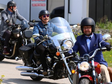 Participants in the Winnipeg version of the Distinguished Gentlemen's Ride gather at motorcycle shop Moto 49 in St. Boniface before travelling to Torque Brewing on King Edward Street in support of men's health charity Movember on Sunday May 21, 2023.