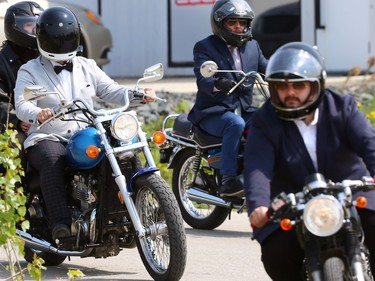 Participants in the Winnipeg version of the Distinguished Gentlemen's Ride gather at motorcycle shop Moto 49 in St. Boniface before travelling to Torque Brewing on King Edward Street in support of men's health charity Movember on Sunday May 21, 2023.
