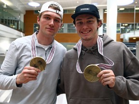 World hockey champions Joel Hofer (left) and Cody Glass
