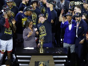 Denver Nuggets head coach Michael Malone celebrates after winning the NBA Finals.