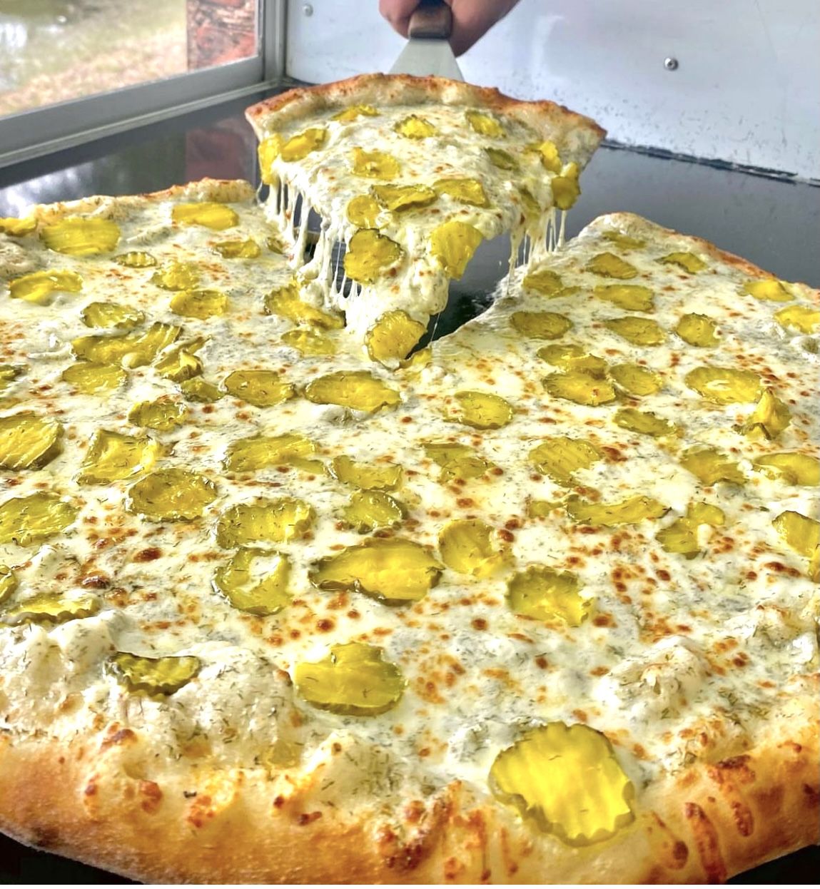 HAL'S KITCHEN Pickle pizza at Red River Ex Winnipeg Sun