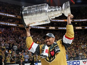 Keegan Kolesar of the Vegas Golden Knights skates with the Stanley Cup.