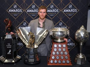 Connor McDavid of the Edmonton Oilers poses with the Ted Lindsay Award, Maurice Richard Trophy, Art Ross Trophy and the Hart Trophy during the 2023 NHL Awards at Bridgestone Arena on June 26, 2023 in Nashville.