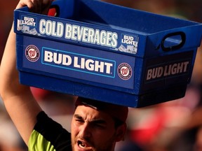 A vendor sells Bud Light beer