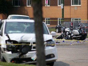 A crash scene involving a motorcyclist