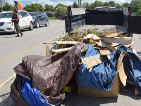 Garbage dumped near a blockade at Brady Road