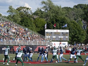 The Argonauts and Roughriders play in last year’s Touchdown Atlantic game at Wolfville, N.S. Today’s rematch, at Halifax, is sold out.