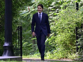 Prime Minister Justin Trudeau arrives for a cabinet swearing-in ceremony at Rideau Hall in Ottawa, Wednesday, July 26, 202.