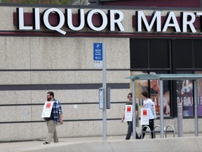 Picketing liquor workers in Winnipeg on Wednesday, July 19, 2023.