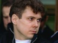 Paul Bernardo leaves a Kingston court after his appeal hearing into his double murder conviction on this Nov. 26, 1997 file photo.