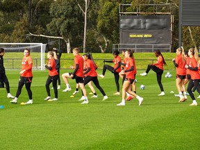 Canadian players work on drills during a training session ahead of the FIFA Women's World Cup in Melbourne, Australia, Wednesday, July 19, 2023.