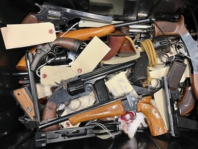 Killarney RCMP seized more than 100 guns and thousands of rounds of ammunition from a home in Wawanesa, Man.