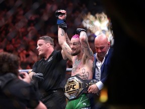 Sean O'Malley celebrates after defeating Aljamain Sterling during their Bantamweight title fight at UFC 292 at TD Garden on August 19, 2023 in Boston, Massachusetts.