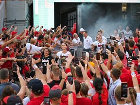 Lexi Rodriguez (#8) of the Nebraska Cornhuskers leads the team on the court before the game against the Omaha Mavericks at Memorial Stadium in Lincoln, Nebraska.