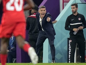Canada head coach John Herdman gestures during a World Cup group-stage match between Canada and Morocco at Al Thumama Stadium in Doha , Qatar, on Dec. 1, 2022.