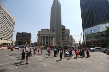 A round dance took place at Portage and Main in Winnipeg at 2PM today, the event is part of a larger call to search local landfills, and to bring justice for Missing and Murdered Indigenous Women and Girls (MMIWG). Thursday Aug 3. Chris Procaylo, Thursday, August 03, 2023 Winnipeg Sun