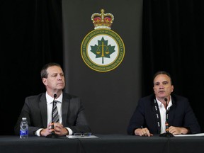 The president of Canada's police leaders association says toughening up the bail system without risking that more racialized people end up behind bars is a "balancing act." Ottawa Police Service Chief Eric Stubbs, left and Chief Danny Smyth, President of the Canadian Association of Chiefs of Police hold a press conference during the CACP Summit in Ottawa on Tuesday, Aug. 22, 2023.