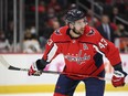 FILE - Washington Capitals right wing Tom Wilson stands on the ice during the first period of an NHL preseason hockey game against the Boston Bruins, Sunday, Sept. 26, 2021, in Washington. The Washington Capitals have signed Wilson to a seven-year contract extension worth $45.5 million. Wilson will count $6.5 million against the salary cap from the time the deal kicks in for the 2024-25 NHL season through 2031.