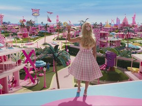 This image released by Warner Bros. Pictures shows Margot Robbie in a scene from "Barbie." Cineplex Inc. says it reaped the rewards of a strong slate of films at the box office last quarter, with smash hits Barbie and Oppenheimer leading the charge since. THE CANADIAN PRESS/AP-Warner Bros. Pictures via AP, File