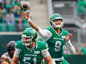 Saskatchewan Roughriders quarterback Jake Dolegala (9) throws against BC Lions during the first half of CFL football action in Regina, on Sunday, August 20, 2023.