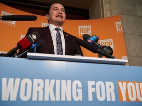 Manitoba NDP Leader Wab Kinew speaks to the media after the delivery of the 2023 budget in the Manitoba Legislative Building in Winnipeg on Tuesday, March 7, 2023. He is promising to move forward on the search of a Winnipeg-area landfill for the remains of two First Nations women if his party forms government after the provincial election this fall.
